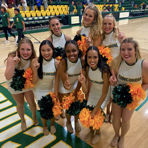 The dance team cheers on the Eagles during basketball season